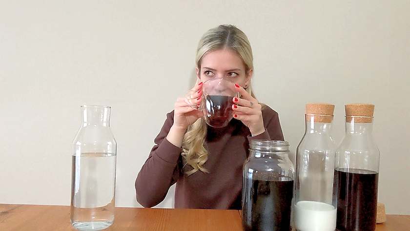 girl drinking cold brew coffee